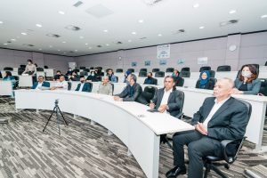 Audience seated in a professional lecture hall